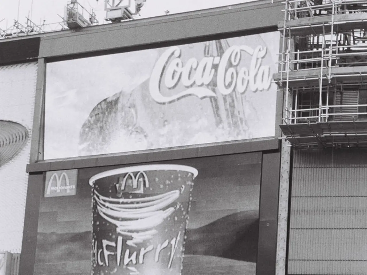 In this image in front there are people holding the pluck cards. Behind them there are buildings.