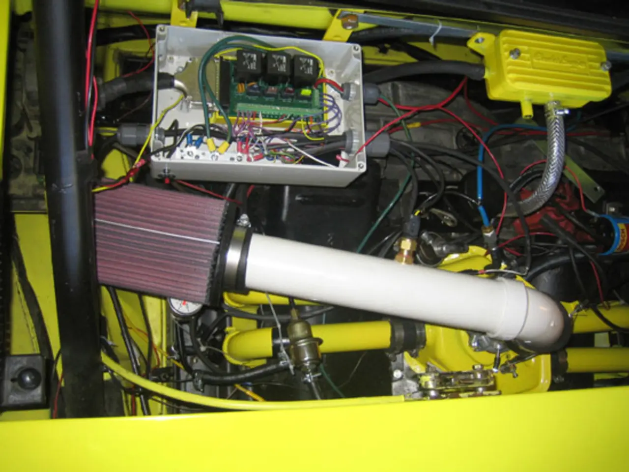 This is a zoomed in picture. In the foreground there is yellow color object seems to be the...