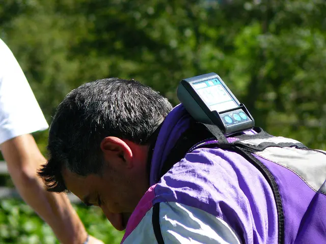 As we can see in the image there are two people, an electrical equipment and trees.