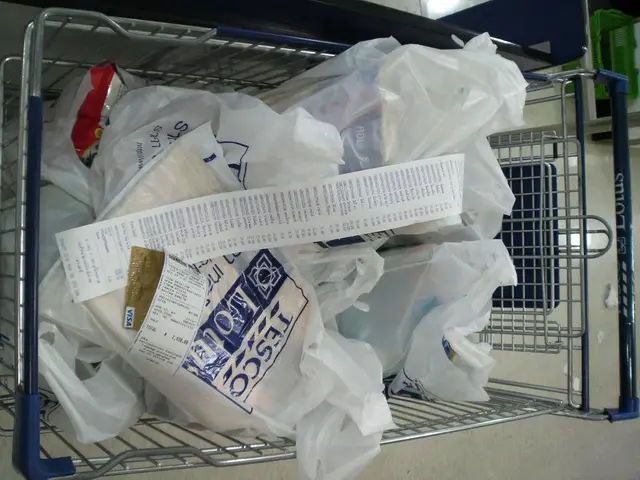 In this picture, we see a trolley. In this trolley, we see many plastic covers containing items. We...